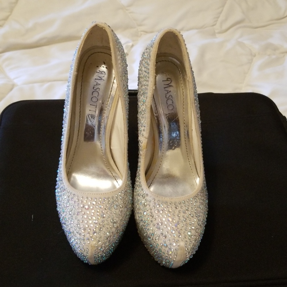 White rhinestone pumps